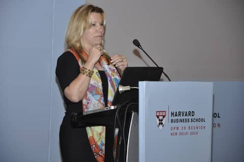 Gayle speaking at HBS "OPM 39 Reunion, New Delhi 2014" podium