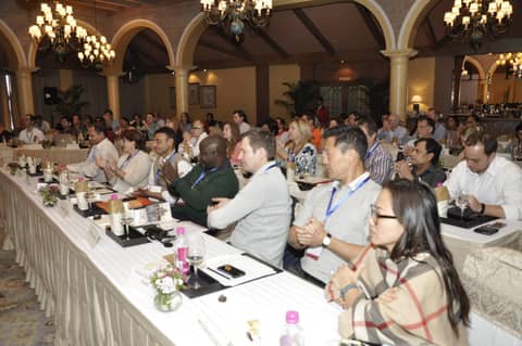 Session hall, classmates watching a speaker