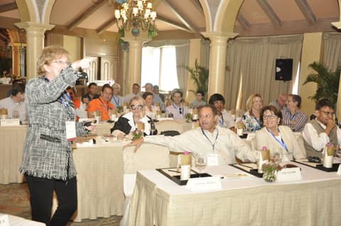 Woman speaking at session (standing)